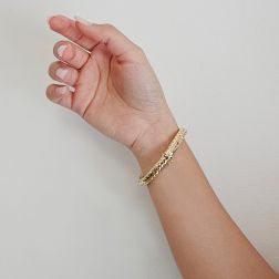 Photo of worn Rigid Snake Bangle bracelet with Emeralds