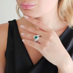 photo of worn Imperial Ring with an Octagonal Emerald and 124 Diamonds