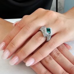 photo of worn Imperial Ring with an Octagonal Emerald and 124 Diamonds
