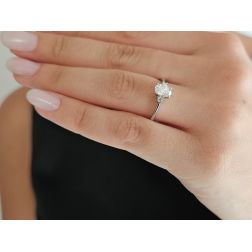 photo of worn Oval Diamond Solitaire Ring 6.7x5mm 0.71ct (GIA) with 2 side Diamonds - Italian Size 14