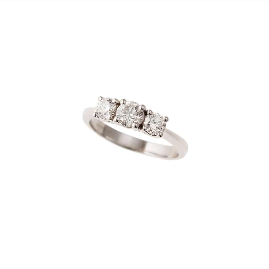 Anello Trilogy Centro da 0.45ct e lati da 0.19ct Diamanti