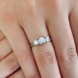 Photo of worn Ring Trilogy 0.45ct center and 0.19ct side Diamonds