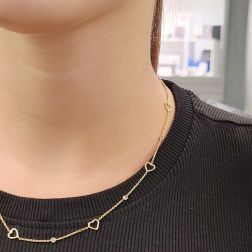 Photo of worn Heart and zircons Necklace