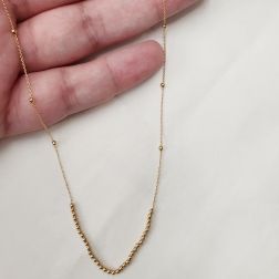 Yellow gold with 35 shiny spheres necklace