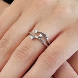 Photo of worn Three-strand Trilogy ring with Diamonds on White Gold