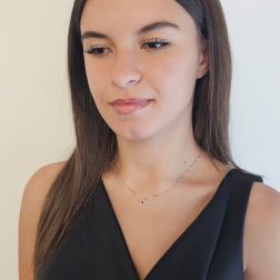 Photo of worn Veneta 0.7mm necklace with rhodolite light point, set in white gold – 7mm