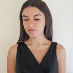 Photo of worn Veneta 0.7mm necklace with a Yellow Topaz accent stone set in white gold – 7mm