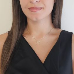 Photo of worn Veneta 0.7mm necklace with a Yellow Topaz accent stone set in white gold – 7mm