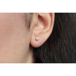 photo of worn Simple Point Light Solitaire Earrings with diamonds weighing 0.08/0.12ct each