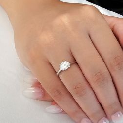Photo of worn SALINA Solitaire Ring with oval cut diamond, 1ct