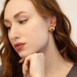 Photo of worn Vintage sunburst clip-on earrings in 18k Yellow Gold