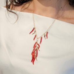 Photo of worn Necklace with Coral Horns and Yellow Gold