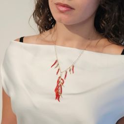 Photo of worn Necklace with Coral Horns and Yellow Gold