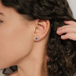 Photo of worn Blue Diamond ‘Punto Luce’ Earrings, 0.53ct, set in a Frame
