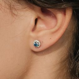Photo of worn Blue Diamond ‘Punto Luce’ Earrings, 0.53ct, set in a Frame
