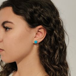 Photo of worn 18kt Yellow Gold Cushion Earrings with Turquoise