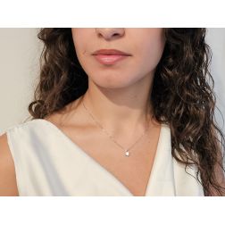 Photo of worn Diamond Sun Light-Point Necklace