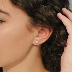 photo of worn, Solitaire earrings with 2 GIA certified Diamonds of 0.53ct G, VS2