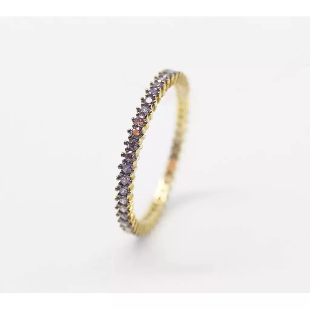 Eternity con zirconi viola e brunitura