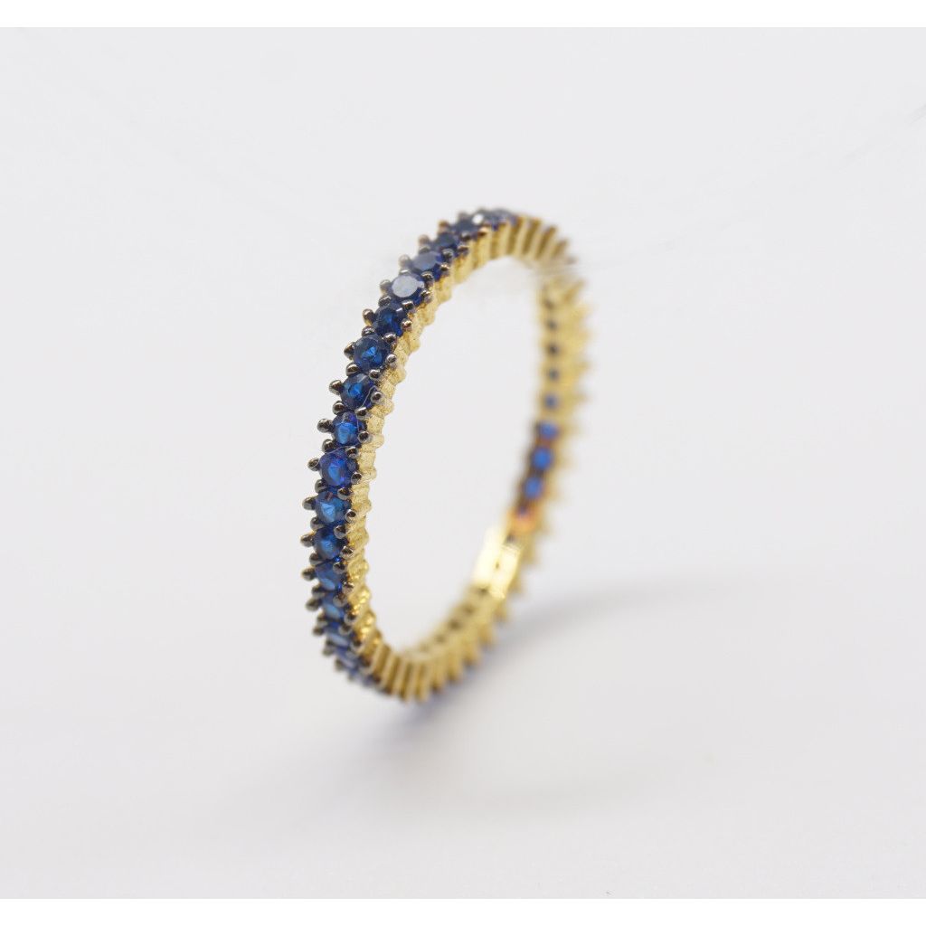 Eternity with blue zircons and burnishing