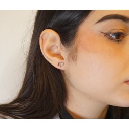 Photo of worn Double star shaped earrings zircons and white gold