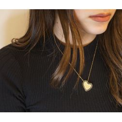 Photo of worn Blue and White Heart and Zircon Necklace