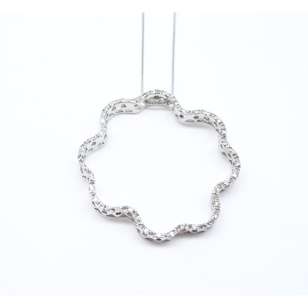 Necklace with stylized Flower and Zircons