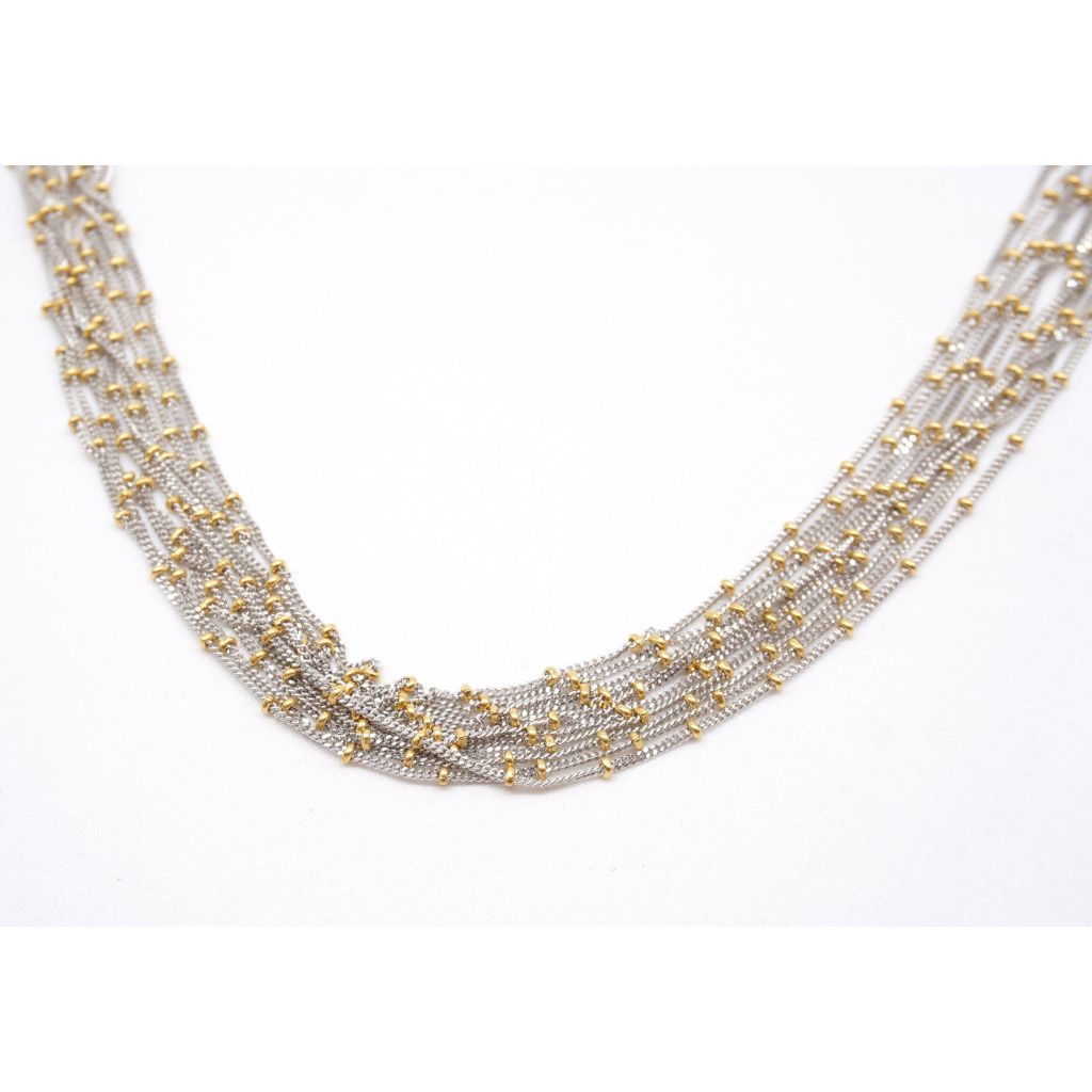Multi-strand necklace in white gold with