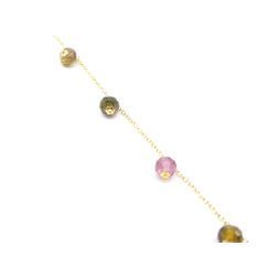 Yellow gold anklet with tourmaline pendants.