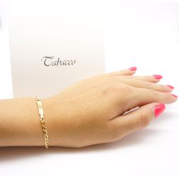 Photo of worn Baby 2.80mm flat oval chain bracelet with 3.90mm tag