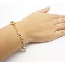 Semirigid flower and moon bracelet