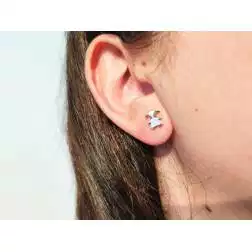 Photo of worn baby-girl earrings in 18kt white gold