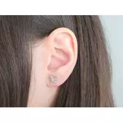 photo of worn Butterfly-shaped earrings Zircons and white gold