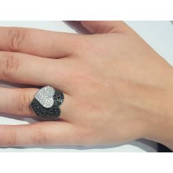 Photo of worn Double Heart ring with Black and White Diamonds in White 18kt gold