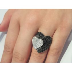 Photo of worn Double Heart ring with Black and White Diamonds in White 18kt gold