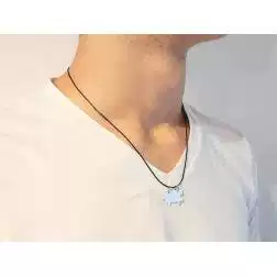 Photo of worn 18kt white gold divisible puzzle pendant