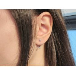 Photo of worn Double earrings with 4 Diamonds in White Gold