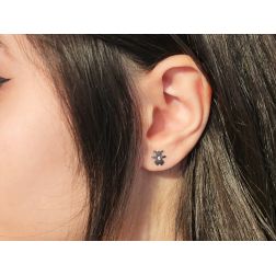 Photo of worn Shiny Baby-Girl earrings with zircon and white gold
