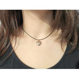 photo of worn Heart charm in 18kt rose gold
