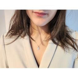 Photo of worn Shiny Baby-Girl charm in 18kt white gold