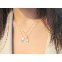 photo of worn Praying Angel charm