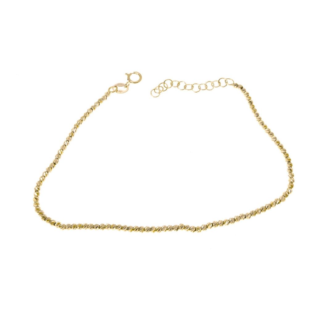 Faceted spheres bracelet 18kt yellow gold