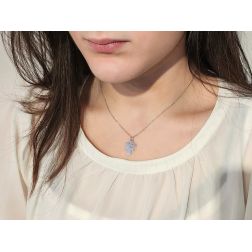 Angel with heart charm in 18kt white gold