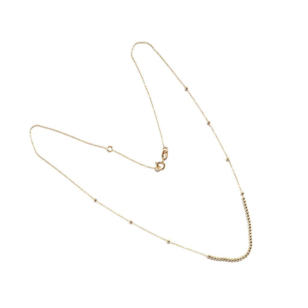 Yellow gold with 35 shiny spheres necklace
