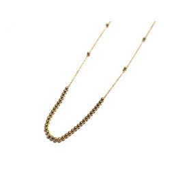 Yellow gold with 35 shiny spheres necklace