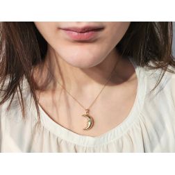 Photo of worn Big Crescent Moon Pendant in Yellow Gold