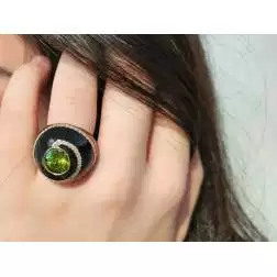Photo of worn Black Dome Ring Peridot Green Rose Gold