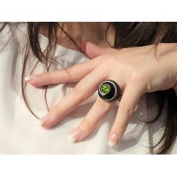 Photo of worn Black Dome Ring Green Peridot White Gold and Diamonds