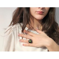 Photo of worn Black Dome Ring Green Peridot White Gold and Diamonds