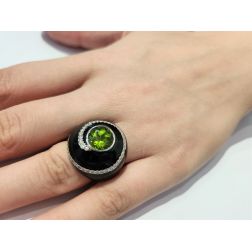 Photo of worn Black Dome Ring Green Peridot White Gold and Diamonds